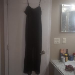 Beautiful long black, sparkly dress.